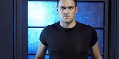 Owain Yeoman on Supergirl